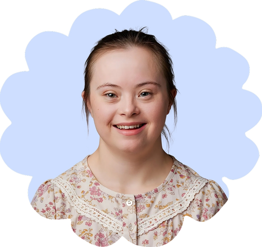 Young person with Trisomy 21 smiling